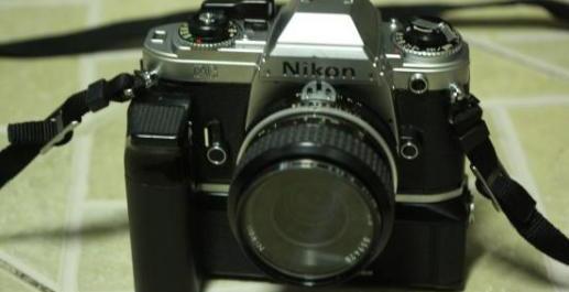 Nikon FG Manual Camera with 35 mm.2.8 lens and motordrive photo